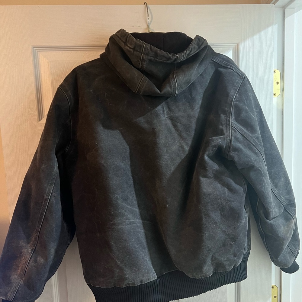 Black Carhartt Duck Jacket. Quilt lined